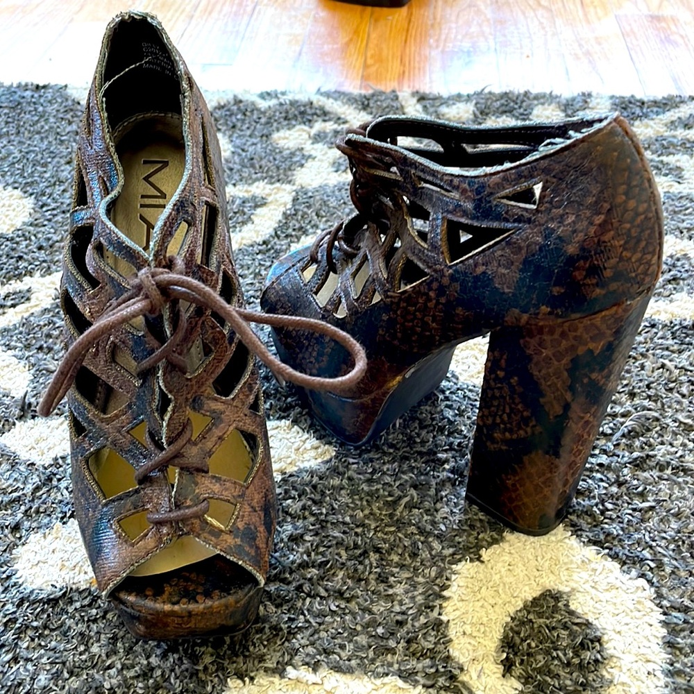 Brown snake skin platform heels